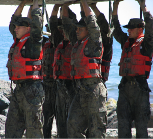 Navy Seals Holding Up A Boat
